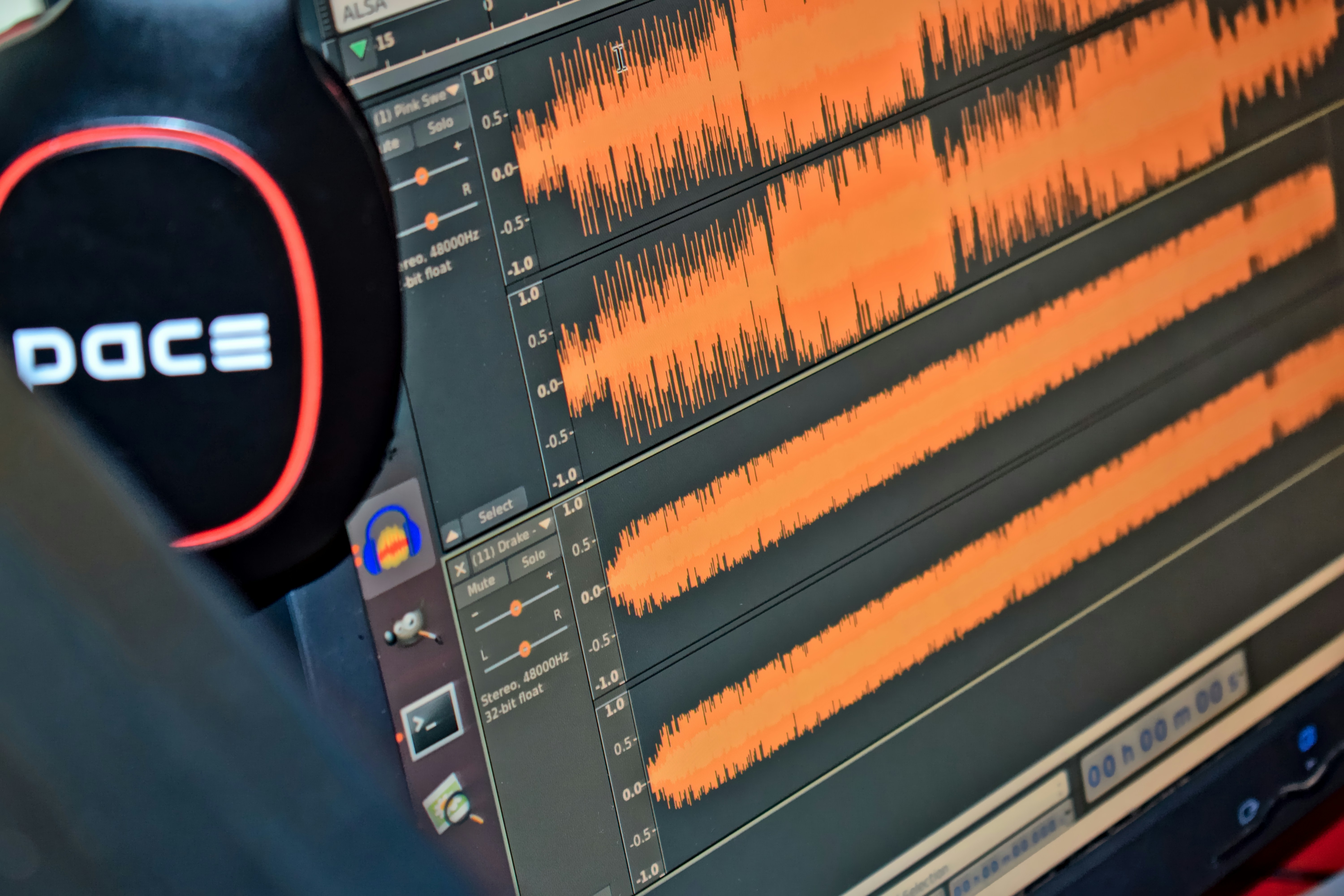 Audio layers in an open music project in a DAW. Photo by Godfrey Nyangechi on Unsplash