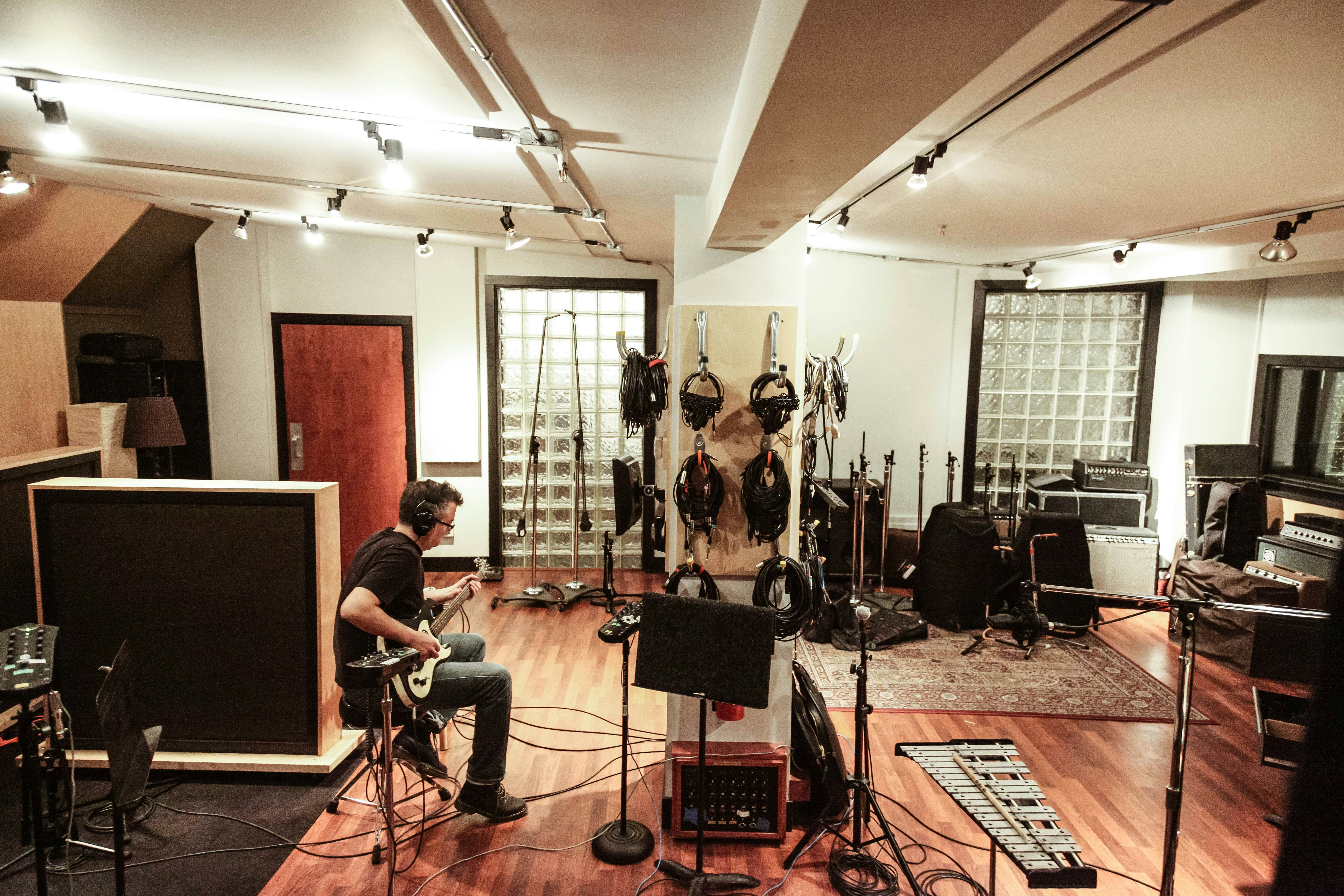 A studio with an musician playing
