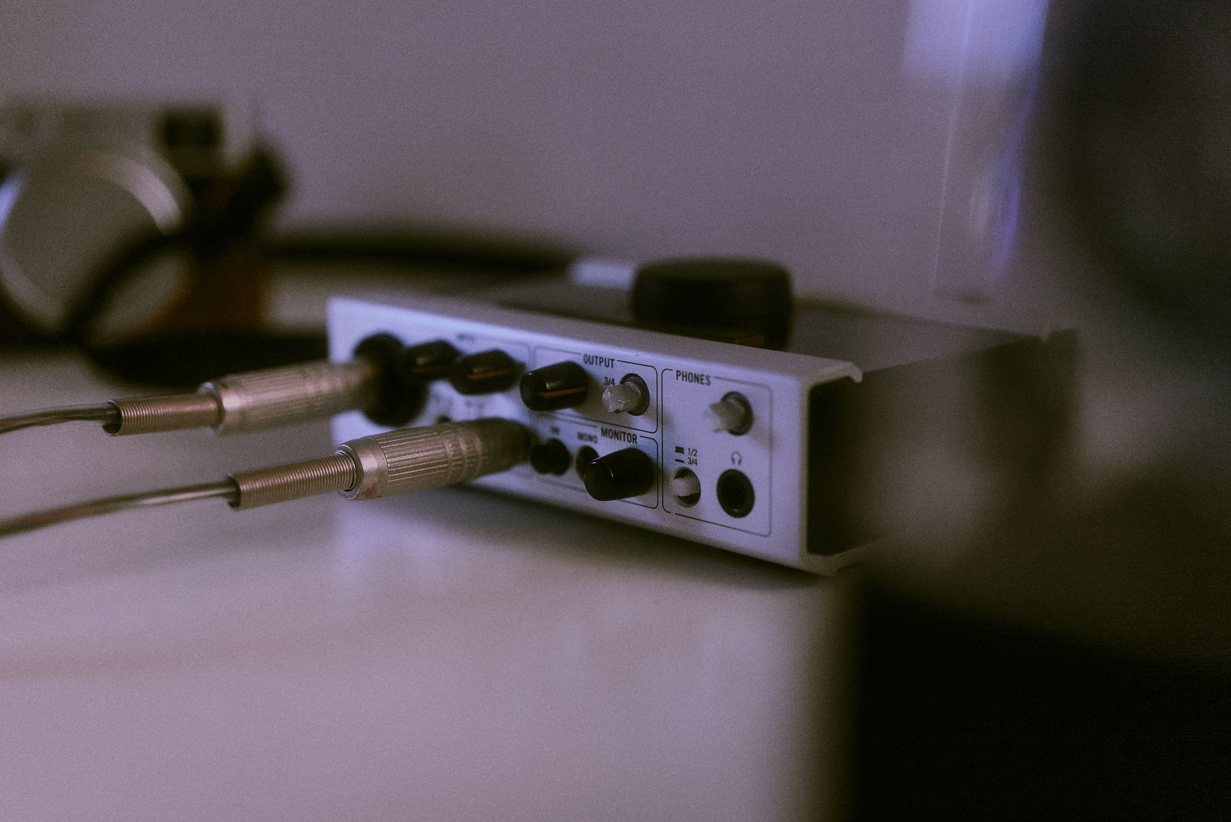 Audio interface plugged in. Photo by COSMOH on Unsplash